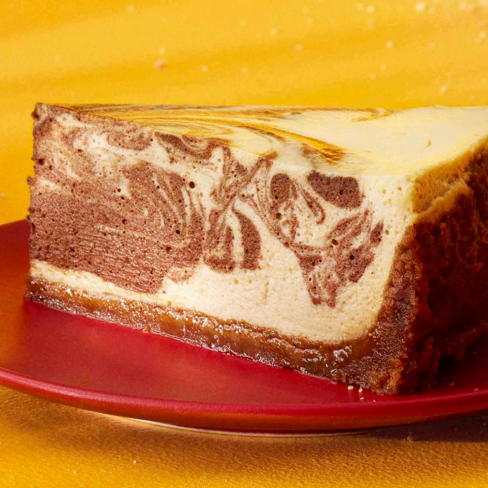 Kahlua cheesecake on a red plate