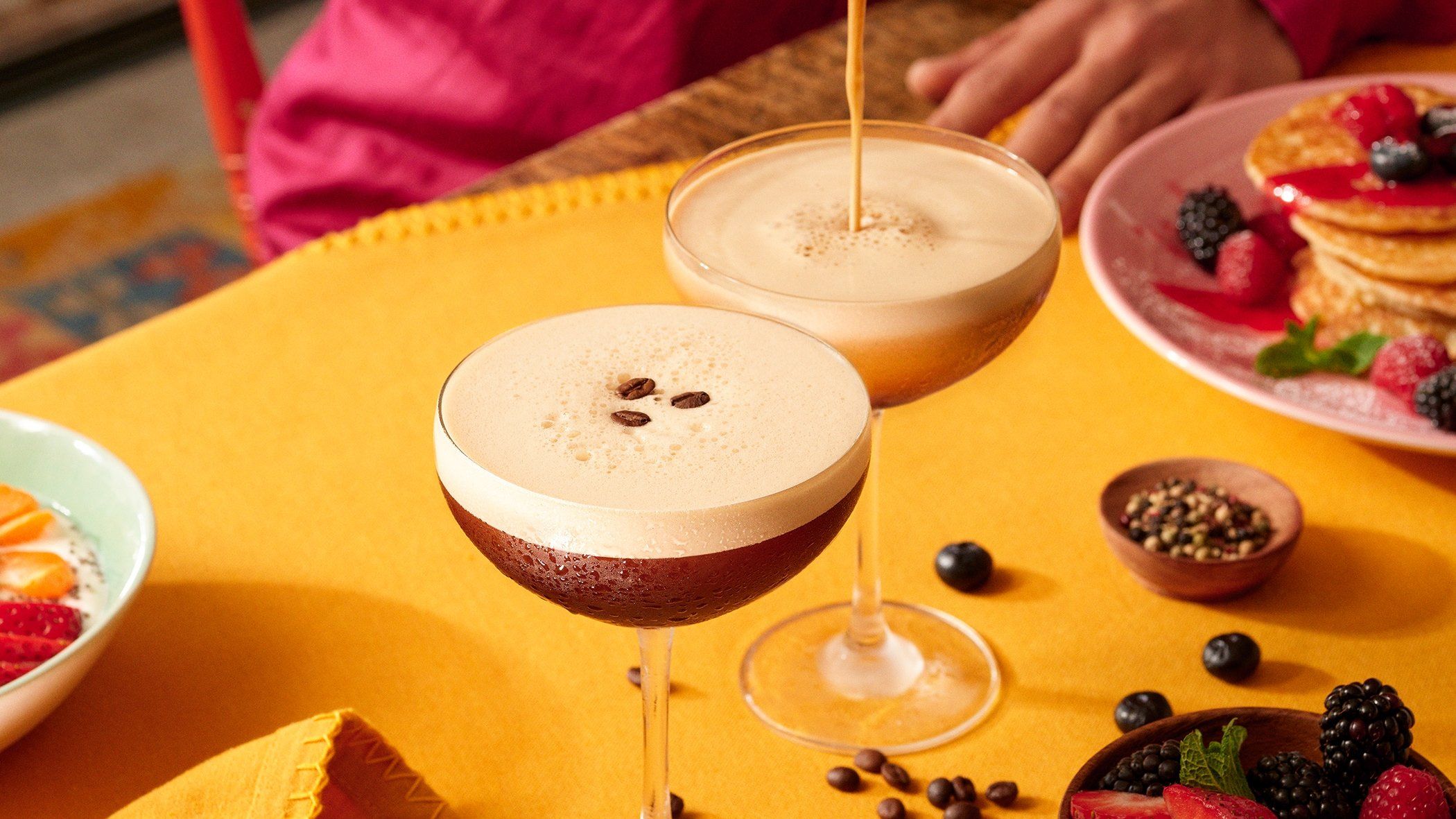 Pouring Kahlua Espresso Martini cocktail