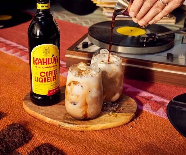 Kahlua and milk cocktail being poured