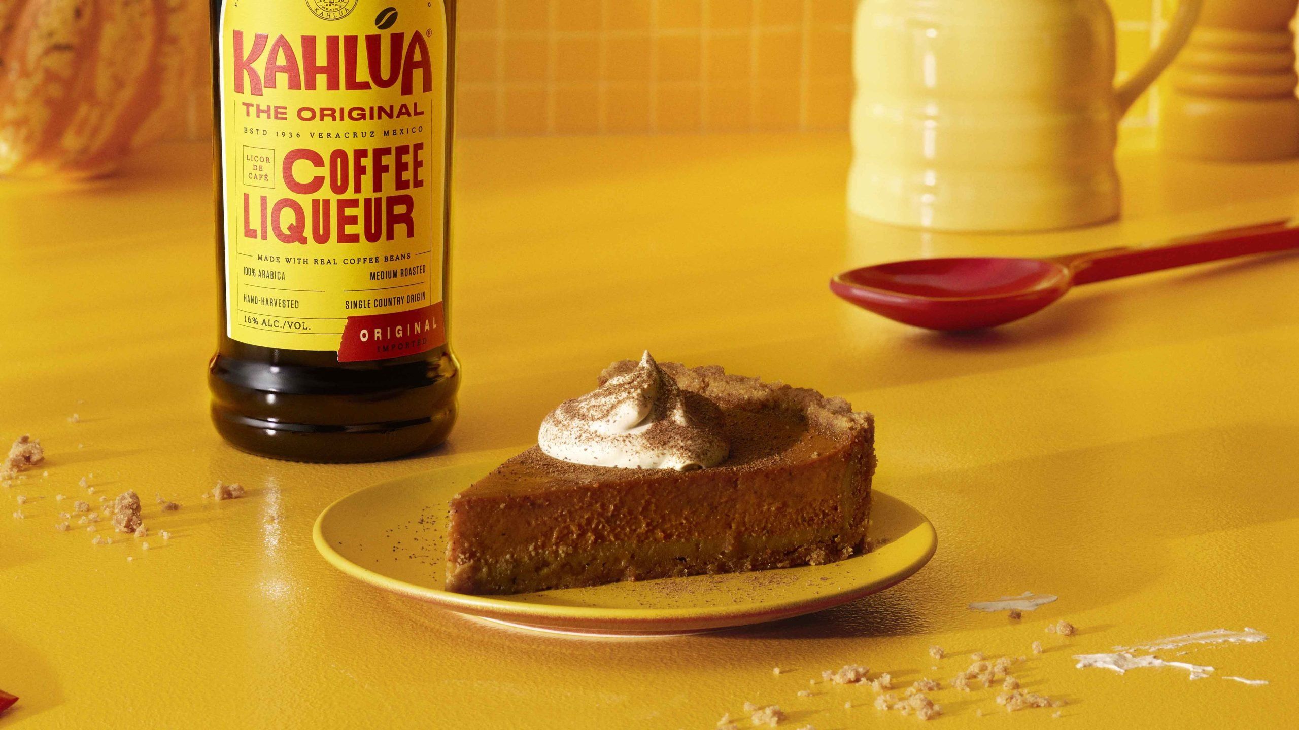 Kahlua Pumpkin Pie dessert on a yellow plate