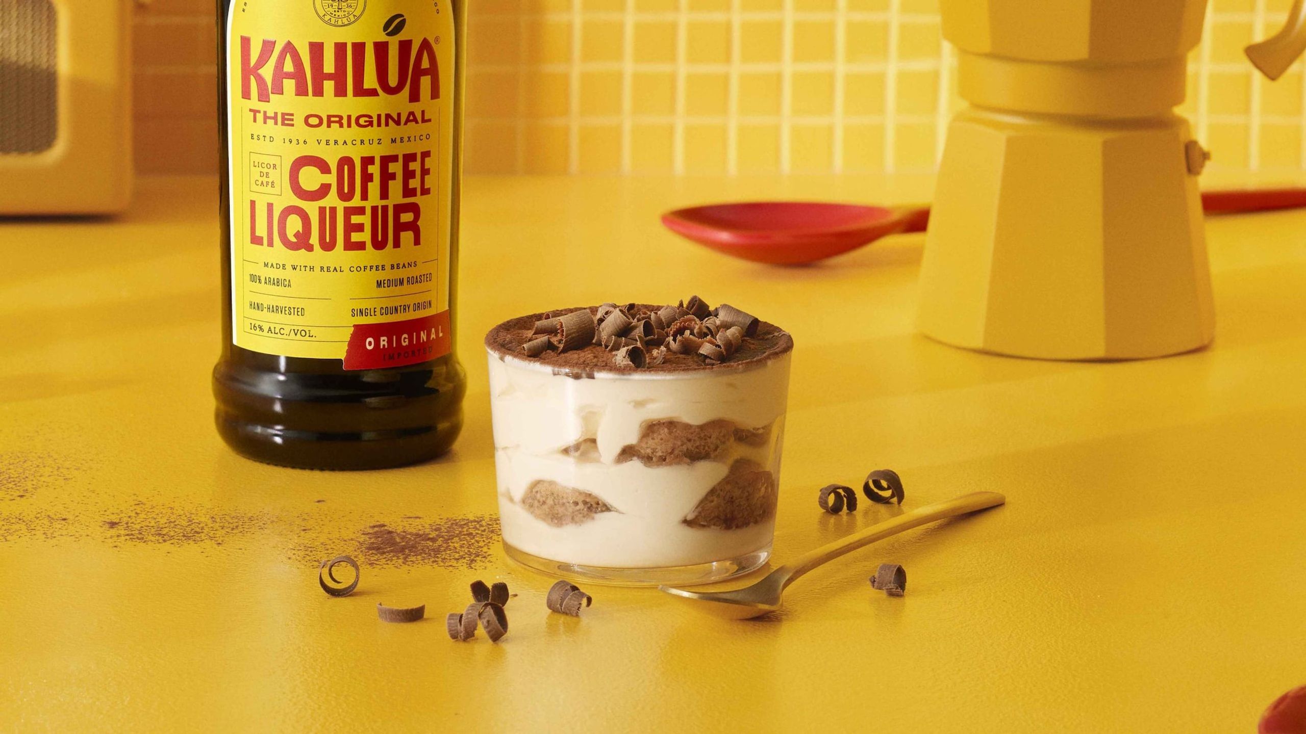 Kahlua Tiramisu dessert on a yellow table