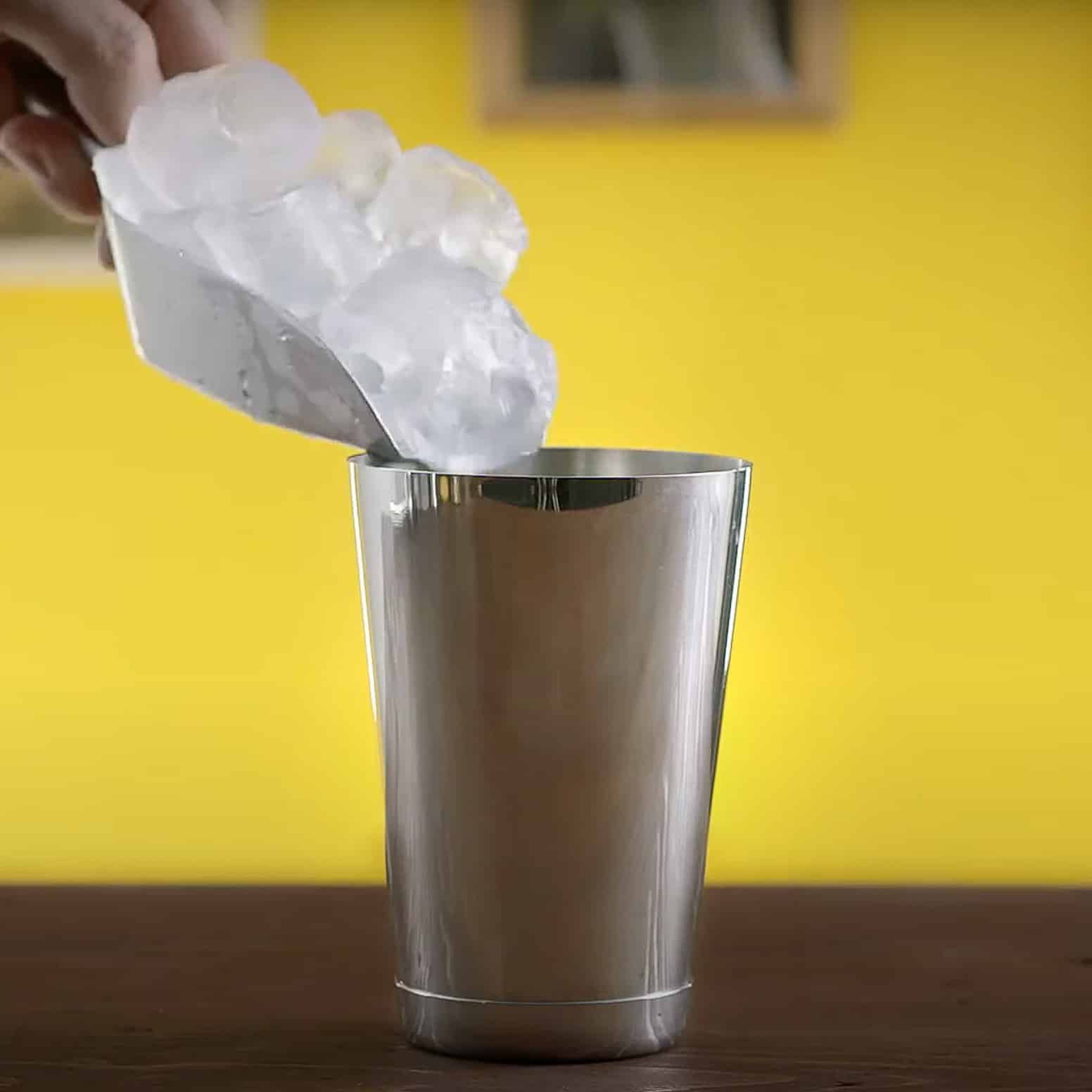 Ice being poured into shaker