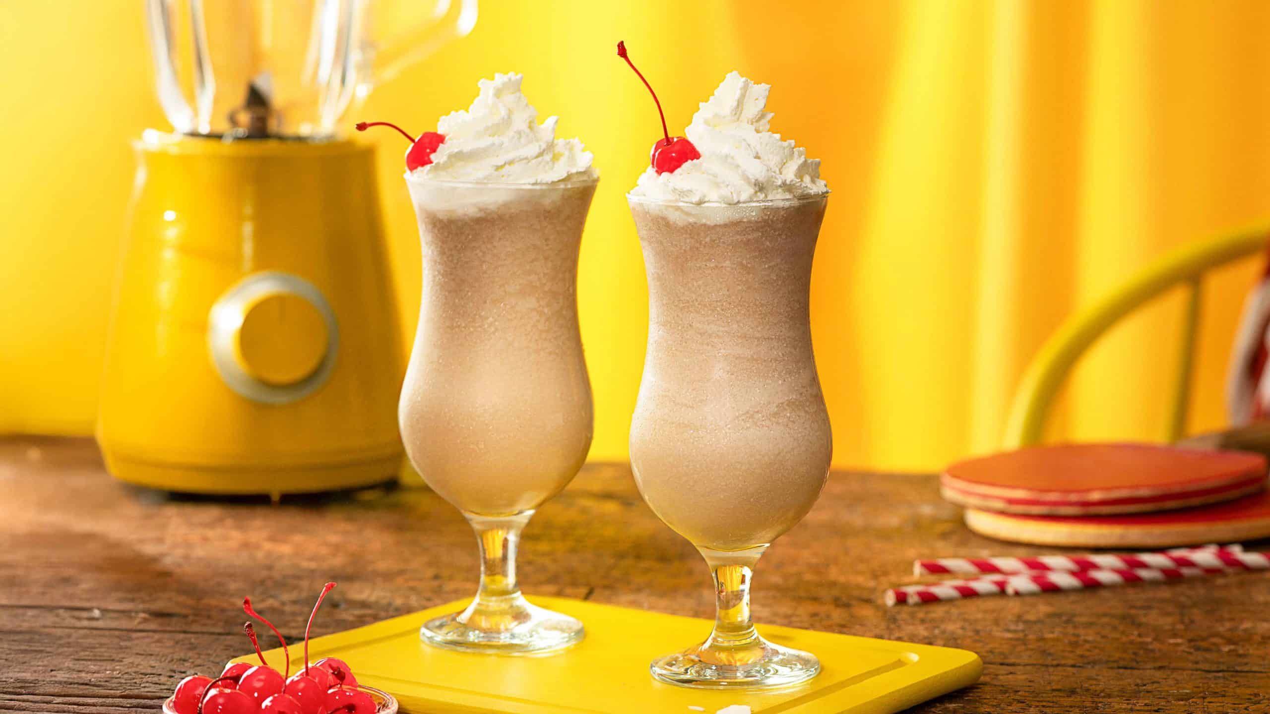 2 bushwacker cocktails on a table