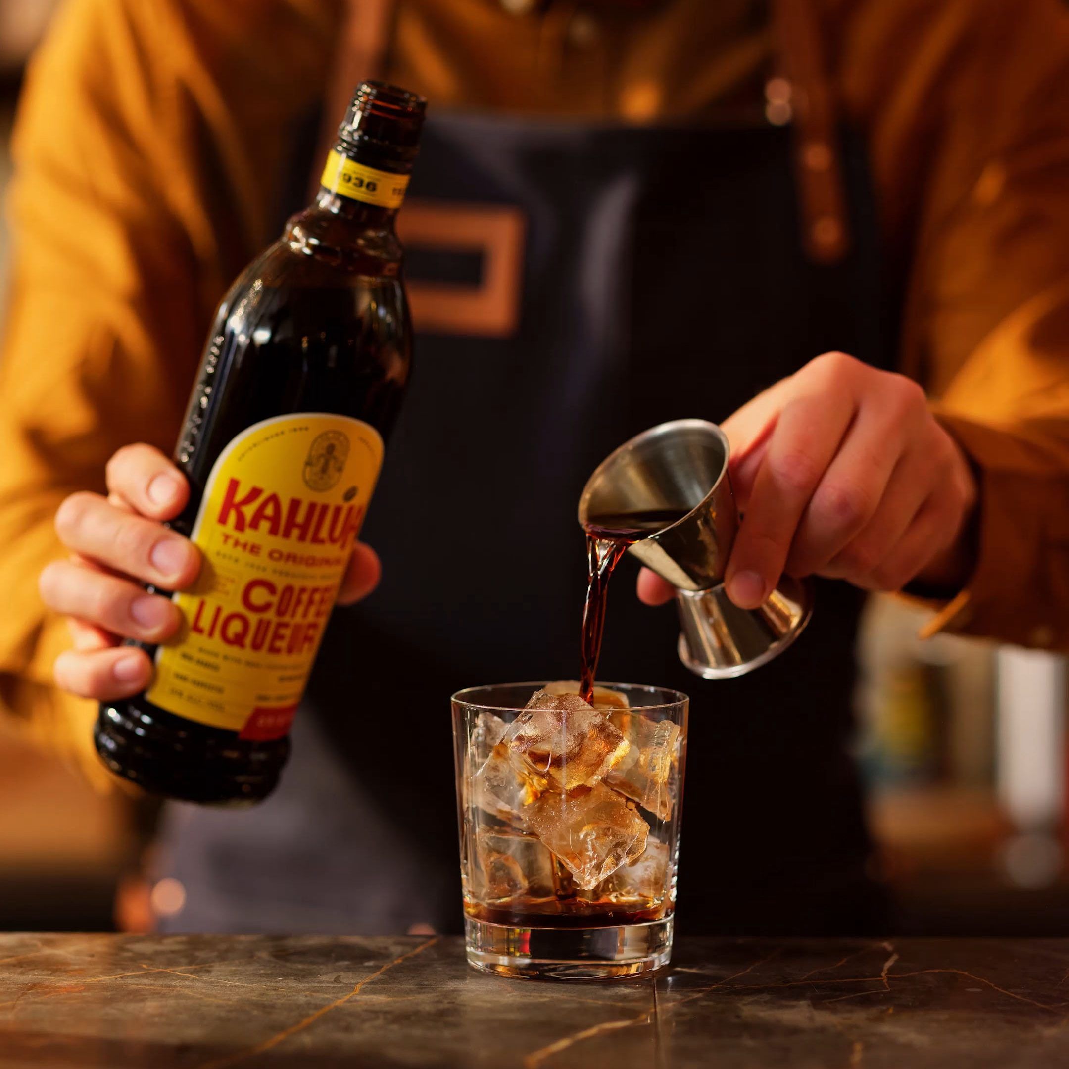 Making Kahlua White Russian cocktail step 2