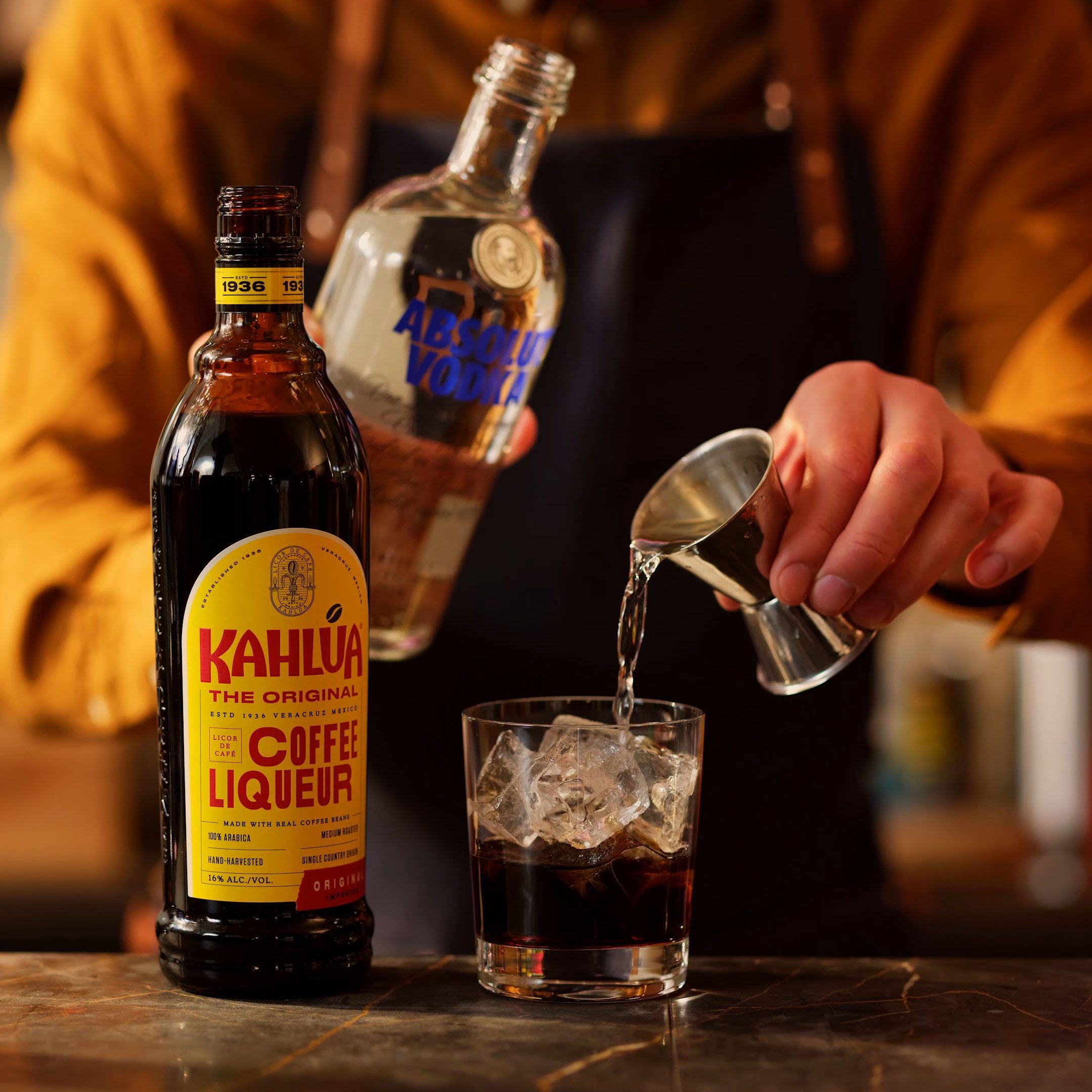 Making Kahlua White Russian cocktail step 3