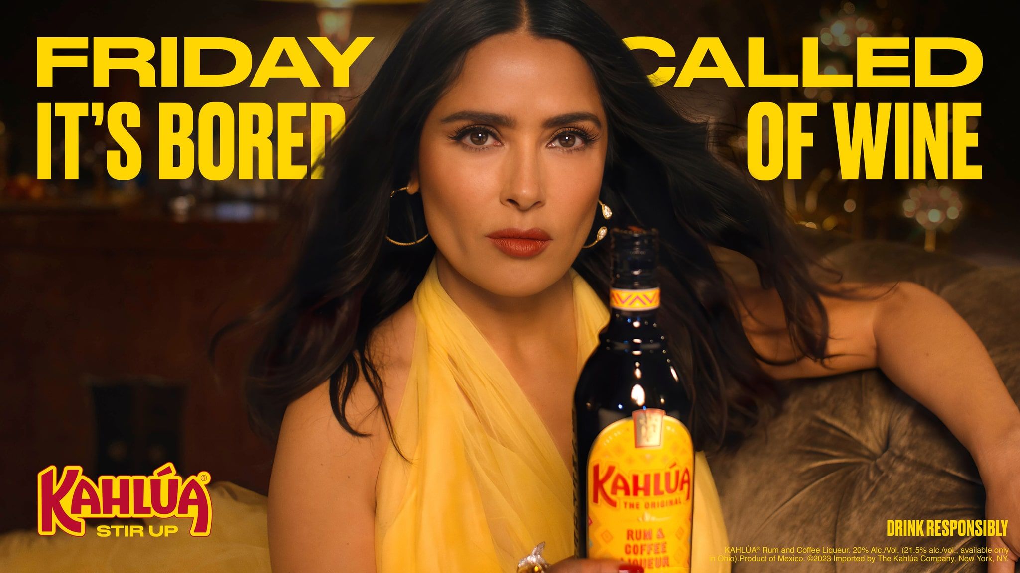 Salma Hayek with a bottle of Kahlua - Friday called it's bored of wine