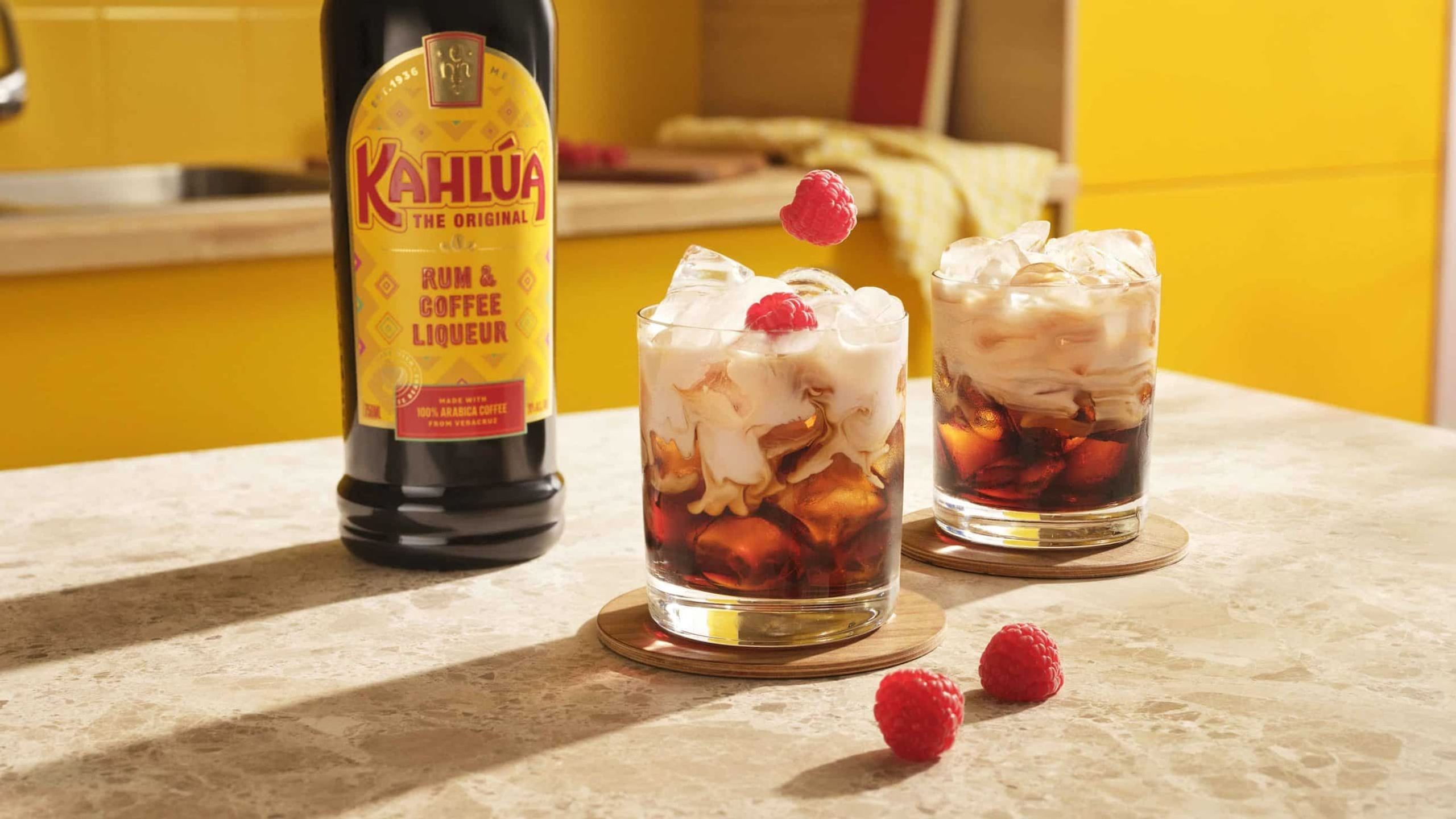 Valentines Day White Russian cocktail with kahlua bottle