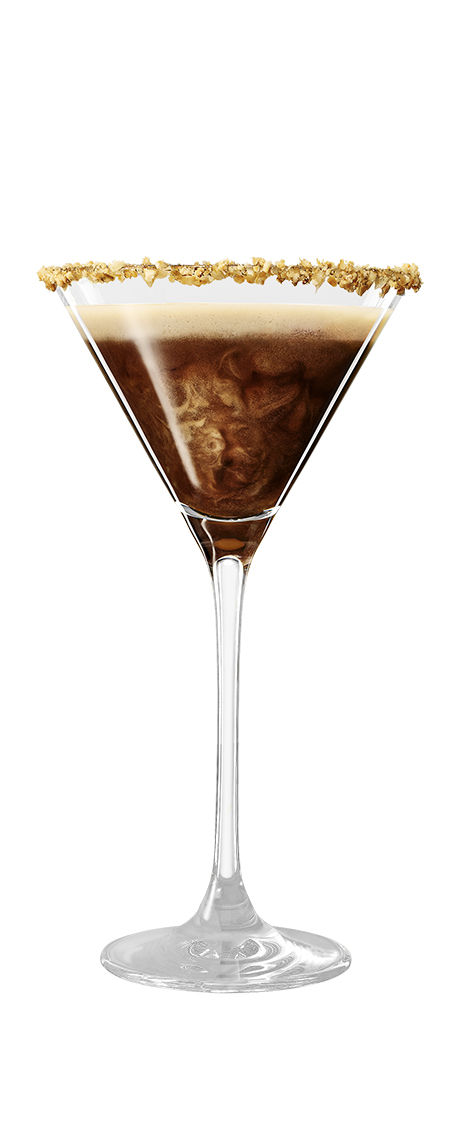 Peanut butter espresso martini cocktail garnished with crushed peanuts in front of a white background