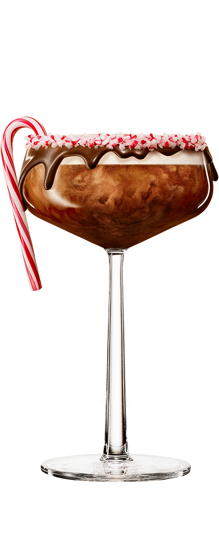One Chocolate Peppermint Martini cocktail garnished with chocolate rim and a candy cane on the side in front of a white background