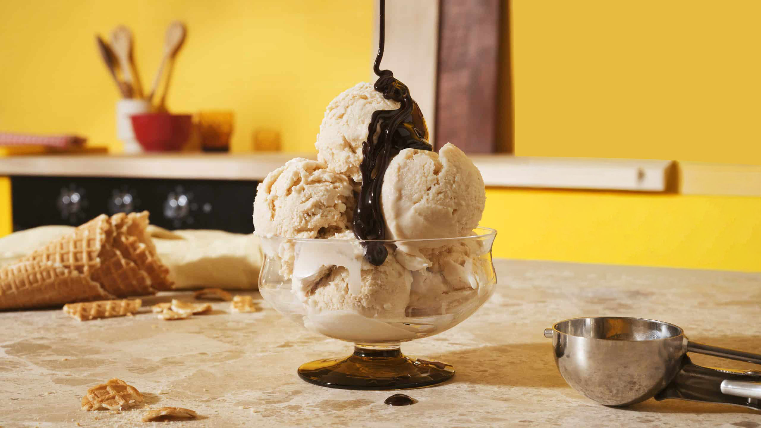 Kahlua Coffee ice cream served in a coupe glass with melted chocolate on top