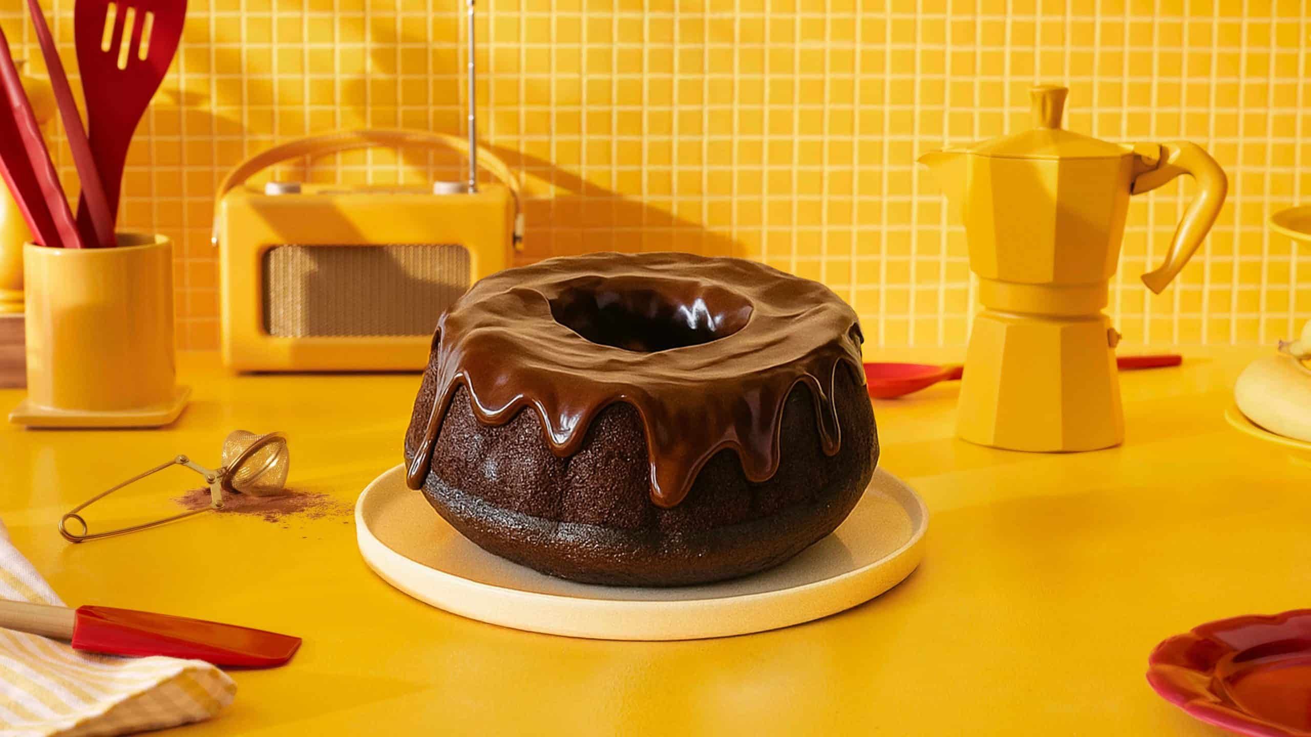 Kahlua triple cake on a serving tray in a kitchen environment